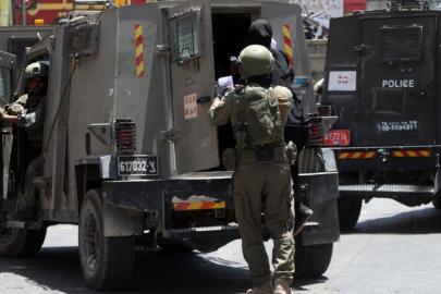 İsrailliler Batı Şeria'da yaşlı bir kadını darbetti